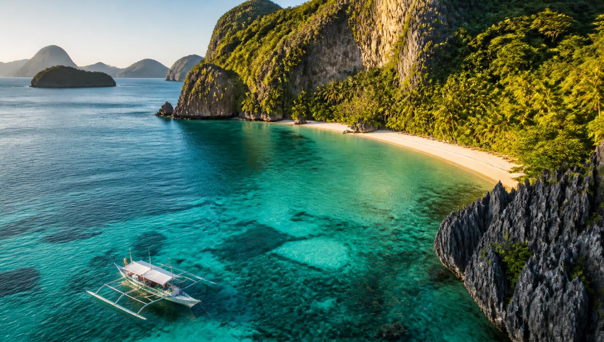 Aerial view of a turquoise lagoon and limestone islands in the Philippines